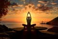 Yoga class by the sea, Silhouetted man finds relaxation at sunset Royalty Free Stock Photo
