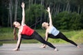 Yoga class: Utthita Parsvakonasana Pose Royalty Free Stock Photo