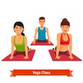 Yoga class workout. Young and healthy people