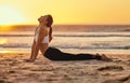 Yoga, cobra stretch and woman at beach for fitness, health and wellness. Sunset, zen chakra and female yogi practicing Royalty Free Stock Photo