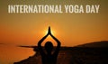 Yoga day, silhouette woman doing yoga in the sunset Sky on celebrating international yoga day Royalty Free Stock Photo