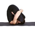 Yoga excercising pindasana