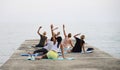 Yoga exercises on the beach. Bulgaria.