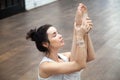Yoga in fitness center: Urdhva mukha paschimottanasana