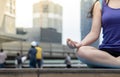 Yoga fitness lifestyle healthy woman relaxation doing a meditation. Yoga meditating outdoor with zen on sitting position. Young Royalty Free Stock Photo