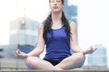 Yoga fitness lifestyle healthy woman relaxation doing a meditation. Yoga meditating outdoor with zen on sitting position. Young Royalty Free Stock Photo