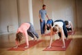 Yoga gets your blood flowing. a group of people attending a yoga class. Royalty Free Stock Photo