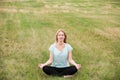 Yoga girl relaxing in nature