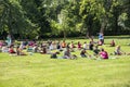 Yoga on the grass in the city park. Prague 2019 June 16