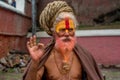 Yoga guru with dreadlocks at the temple in Kathmandu in Nepal Royalty Free Stock Photo