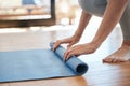 Yoga, hands and woman rolling mat in fitness studio to start workout and meditation. Gym, pilates and meditating for