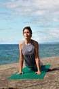 Yoga heals the soul. an attractive and healthy young woman on the promenade.