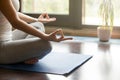 Yoga at home: meditating close-up Royalty Free Stock Photo