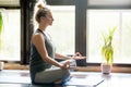 Yoga at home: meditating woman Royalty Free Stock Photo