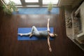 Yoga at home: Revolved Abdomen Pose Royalty Free Stock Photo