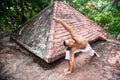 Yoga horizon pose on the roof Royalty Free Stock Photo