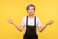 Yoga inner peace. Portrait of calm hipster woman holding fingers in mudra gesture. yellow background, studio shot