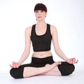 Yoga lotus pose padmasana by fit young woman