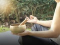 Yoga man with singing bowl for meditation Royalty Free Stock Photo