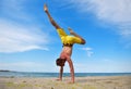 Yoga man standing on hands Royalty Free Stock Photo