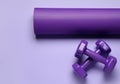 Yoga mat and dumbbells