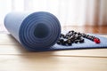 Yoga mat with mala beads Royalty Free Stock Photo