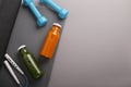 Yoga mat, protein and detox bottles, dumbbells and jumping rope Royalty Free Stock Photo