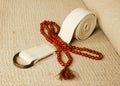 Yoga mat with rosaries and strap Royalty Free Stock Photo