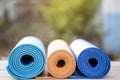 Yoga mats on the table in a garden Royalty Free Stock Photo
