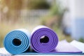 Yoga mats on the table in a garden Royalty Free Stock Photo