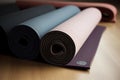 Yoga mats are on a table in a store. AI generation