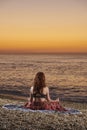 Yoga and meditation on calm beach at sunrise Royalty Free Stock Photo