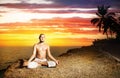 Yoga meditation near the ocean Royalty Free Stock Photo