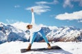 Yoga on mountain in winter Royalty Free Stock Photo