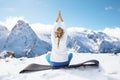 Yoga on mountain in winter Royalty Free Stock Photo