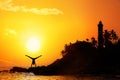 Yoga near lighthouse Royalty Free Stock Photo