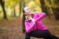 Yoga outdoors: Parivrtta Parsvakonasana Royalty Free Stock Photo