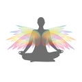 Yoga person in a lotus pose with colorful wings