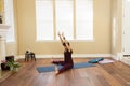 Yoga Pose Upavista Konasana seated indoors Royalty Free Stock Photo