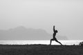 Yoga pose, woman meditating at the beach Royalty Free Stock Photo