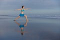 Yoga pose. Young woman practicing Virabhadrasana II, Warrior 2. Yoga retreat. Self care concept. Balance and concentration. Strong Royalty Free Stock Photo