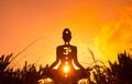 Yoga position silhouette in contrasting sun, Sacral chakra Royalty Free Stock Photo