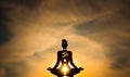 Yoga position silhouette in contrasting sun, Solar Plexus chakra