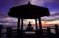 yoga practicing by the sea sunset Royalty Free Stock Photo