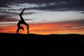 Yoga practicioner during the sunse Royalty Free Stock Photo