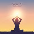 Yoga for pregnant women silhouette on summer meadow at sunshine