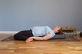 Reclining Hero Pose or Supta Virasana. Pregnant woman resting in yoga asana Royalty Free Stock Photo