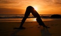 Yoga, silhouette and downward dog on sunset beach, ocean or sea in workout or relax exercise training. Yogi, woman and Royalty Free Stock Photo