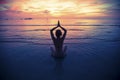 Yoga silhouette, exercises on the beach. Nature. Royalty Free Stock Photo
