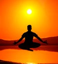 Yoga silhouette lotus pose in jumping Royalty Free Stock Photo